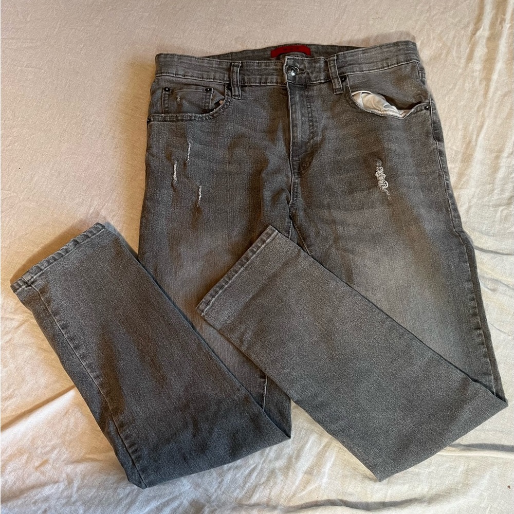 Grey jeans with small rip M.B.X